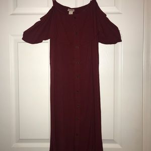 Dark red dress with cut out shoulders. Runs small.